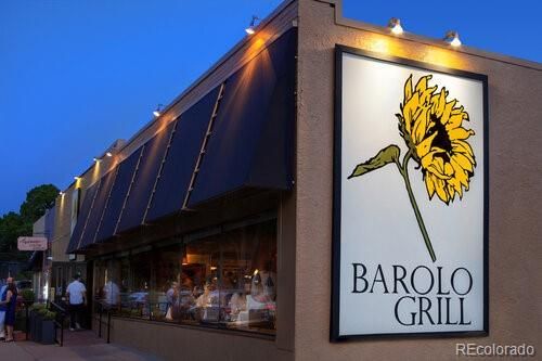 a view of city with the shops and fruits market