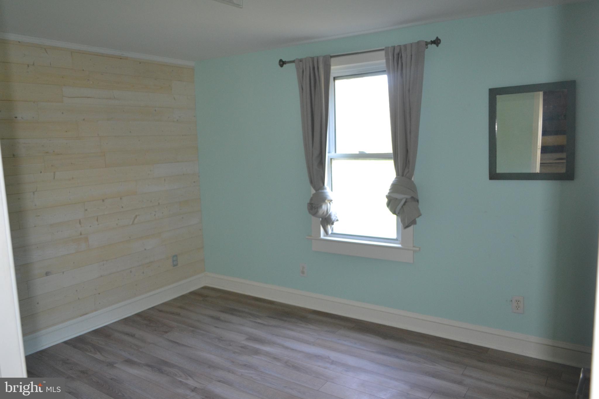 6356 Landing Neck Road Easton, MD 21601 - Photo 12 of 20 Bedroom #2 with accent wall