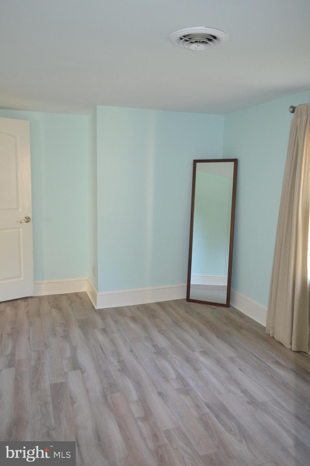 6356 Landing Neck Road Easton, MD 21601 - Photo 9 of 20 Bedroom with Walk-in closet & TV