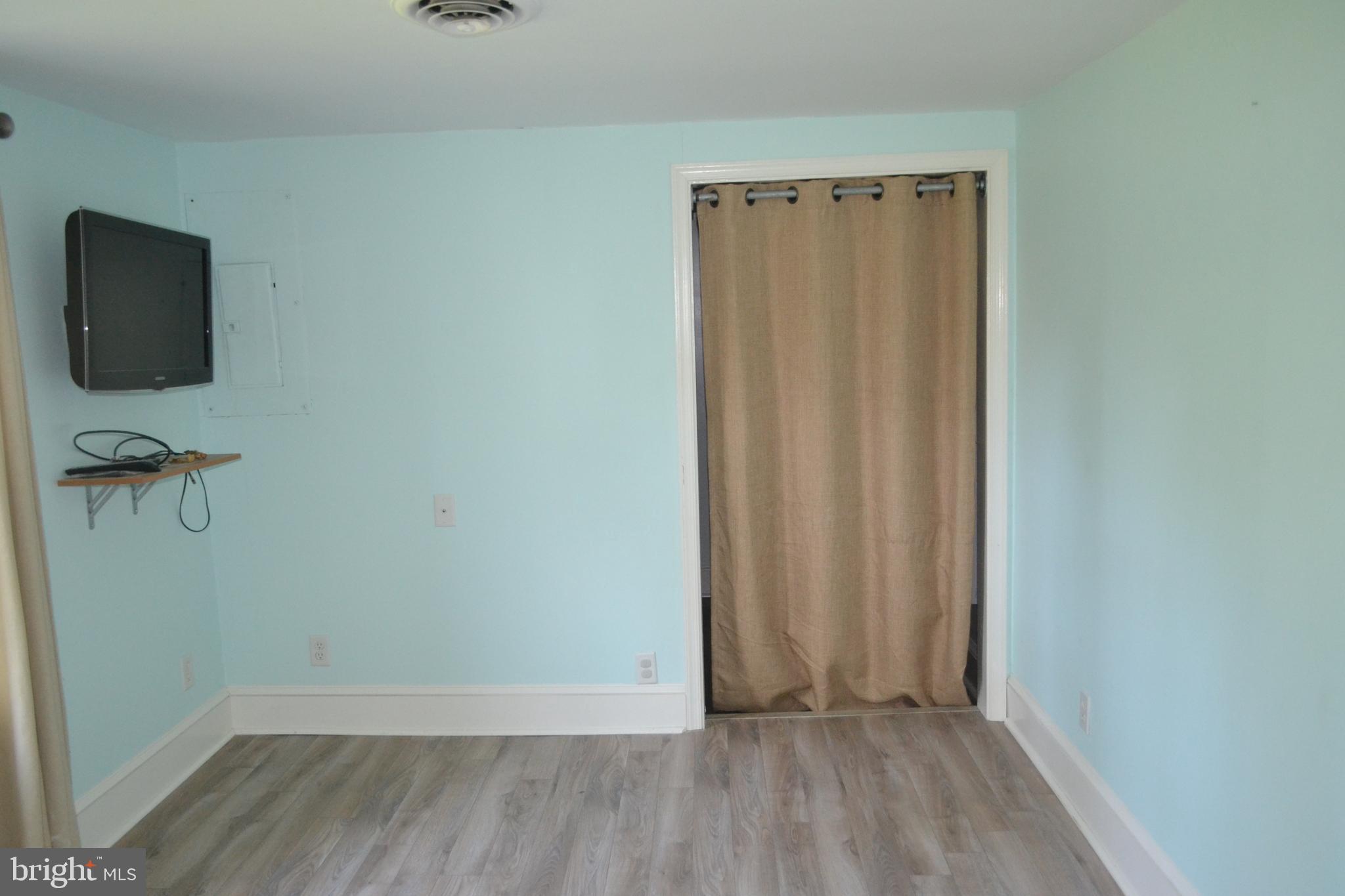 6356 Landing Neck Road Easton, MD 21601 - Photo 10 of 20 Wall-mounted Flat Screen TV included
