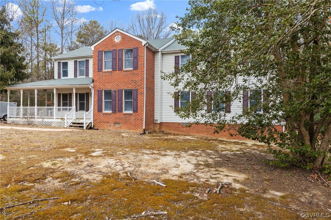 9106 Hickory Road Chesterfield, VA 23838 - Photo 34 of 42 a front view of a house with a yard