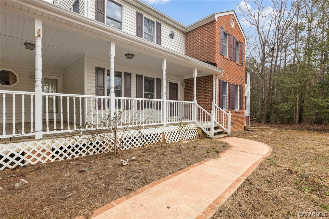 9106 Hickory Road Chesterfield, VA 23838 - Photo 36 of 42 a view of a house with a small yard and wooden fence