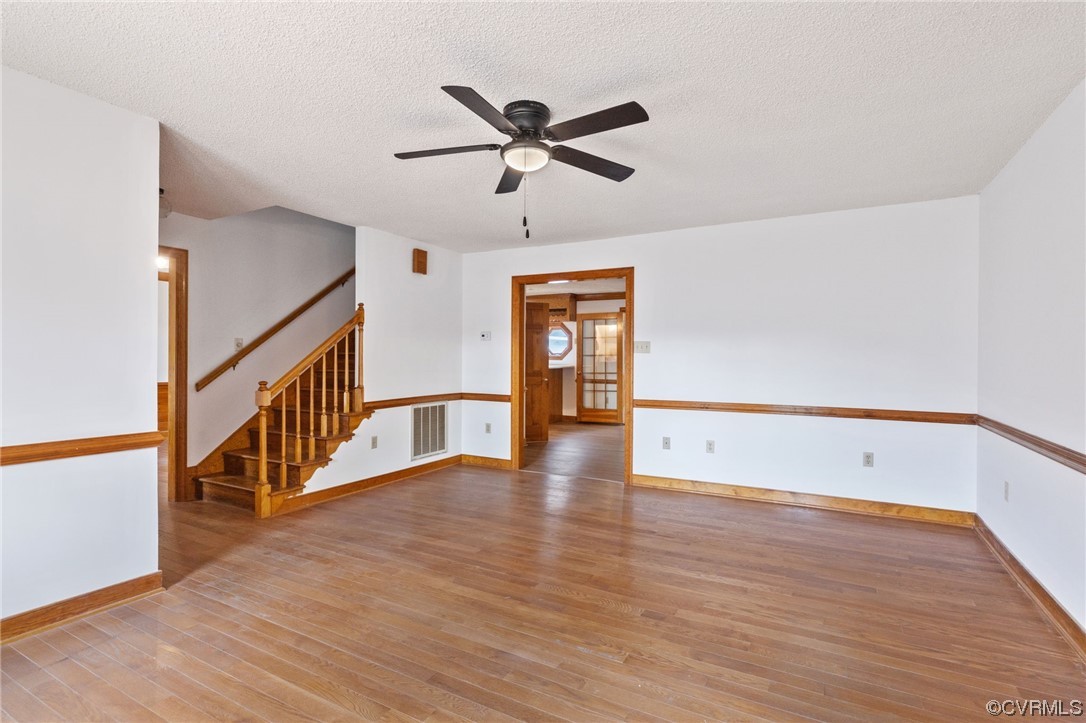 9106 Hickory Road Chesterfield, VA 23838 - Photo 7 of 42 a view of an empty room with wooden floor