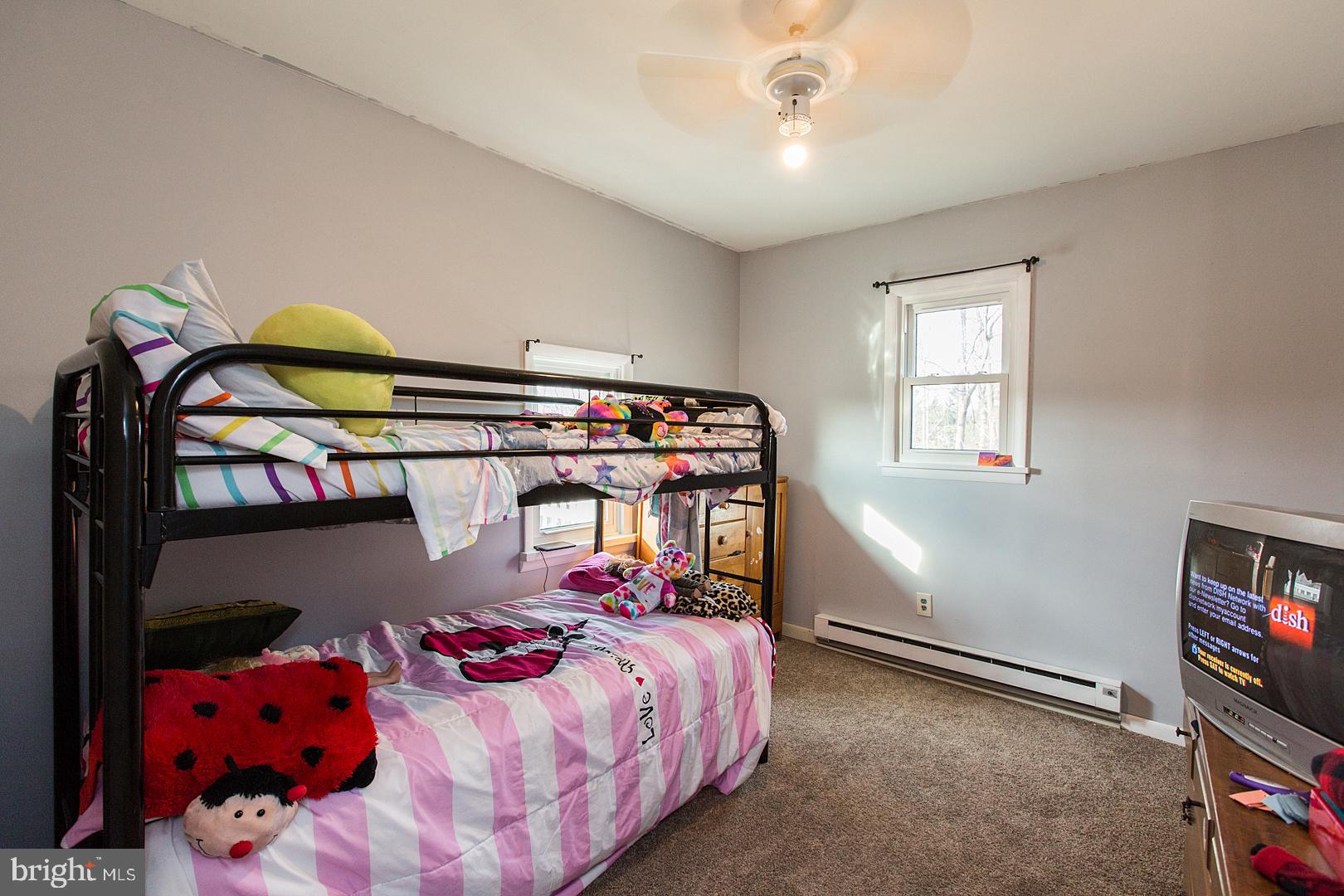 38 Fulton View Road Quarryville, PA 17566 - Photo 22 of 42 a bedroom with a bed and a tv on the dresser