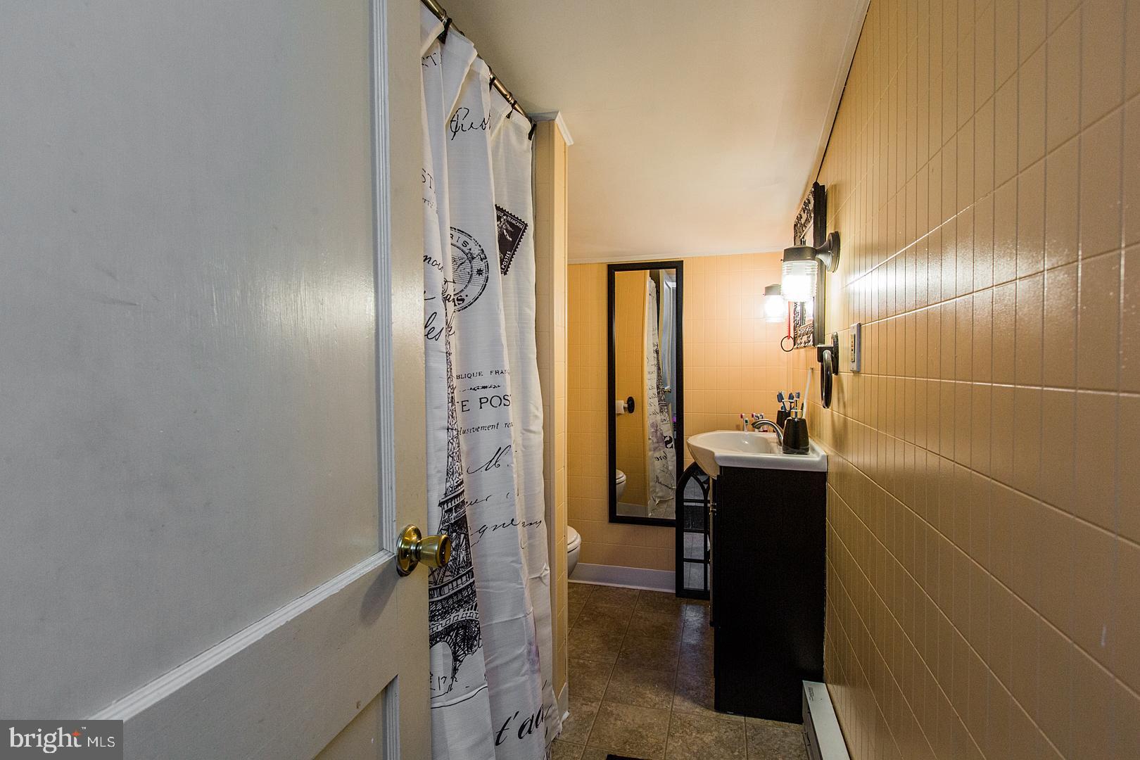 38 Fulton View Road Quarryville, PA 17566 - Photo 25 of 42 a bathroom with a bathtub and a shower
