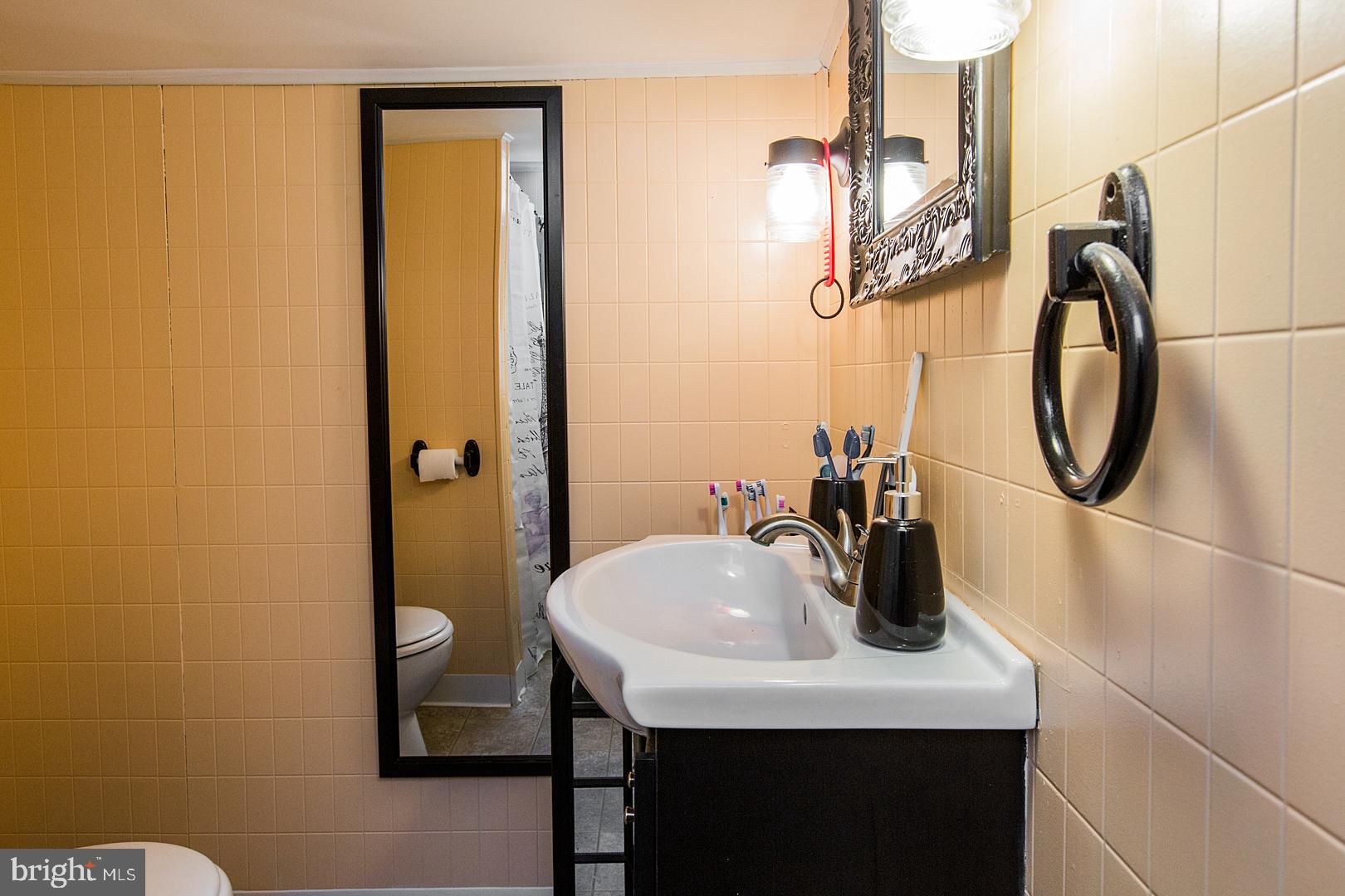 38 Fulton View Road Quarryville, PA 17566 - Photo 26 of 42 a bathroom with a sink and mirror