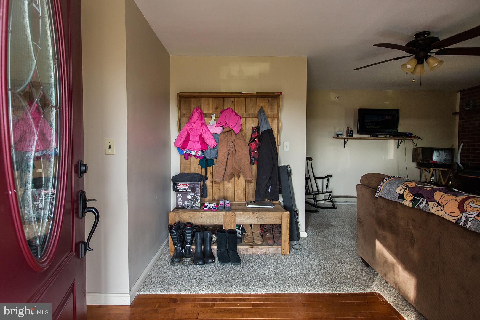 38 Fulton View Road Quarryville, PA 17566 - Photo 7 of 42 a living room with furniture a rug and a flat screen tv