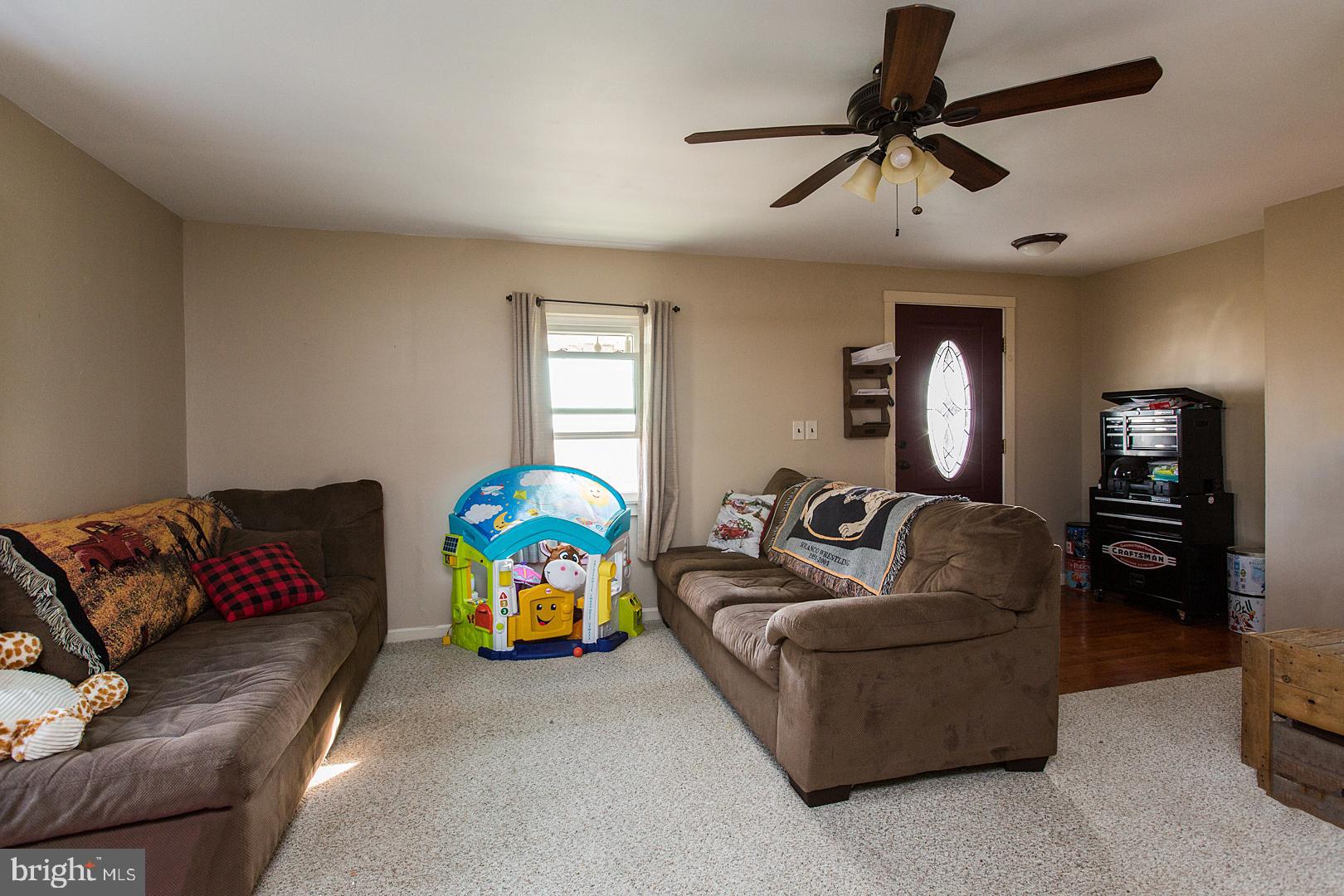 38 Fulton View Road Quarryville, PA 17566 - Photo 9 of 42 a living room with furniture and a couch