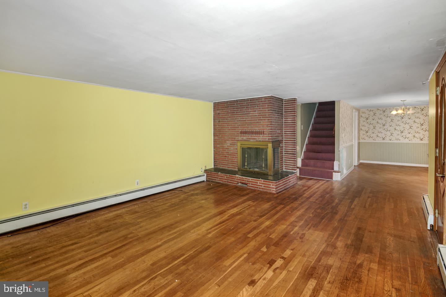 111 Lejune Road Cinnaminson, NJ 08077 - Photo 4 of 23 Liv ing room w/wood burning firepace.