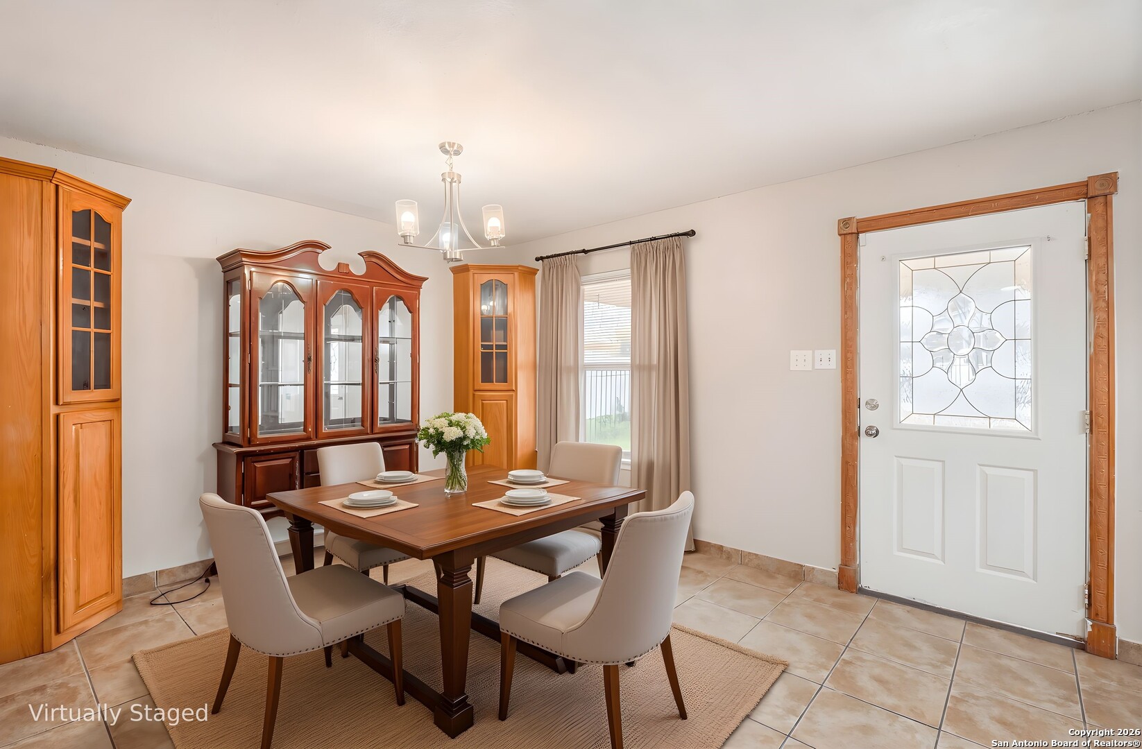 5207 Overpool Street San Antonio, TX 78228 - Photo 5 of 31 a view of a dining room with furniture and window