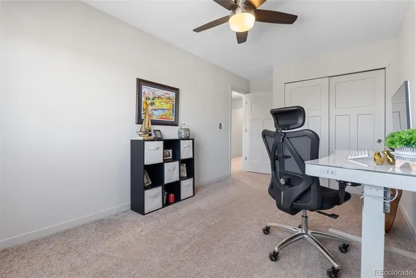a view of a workspace with furniture