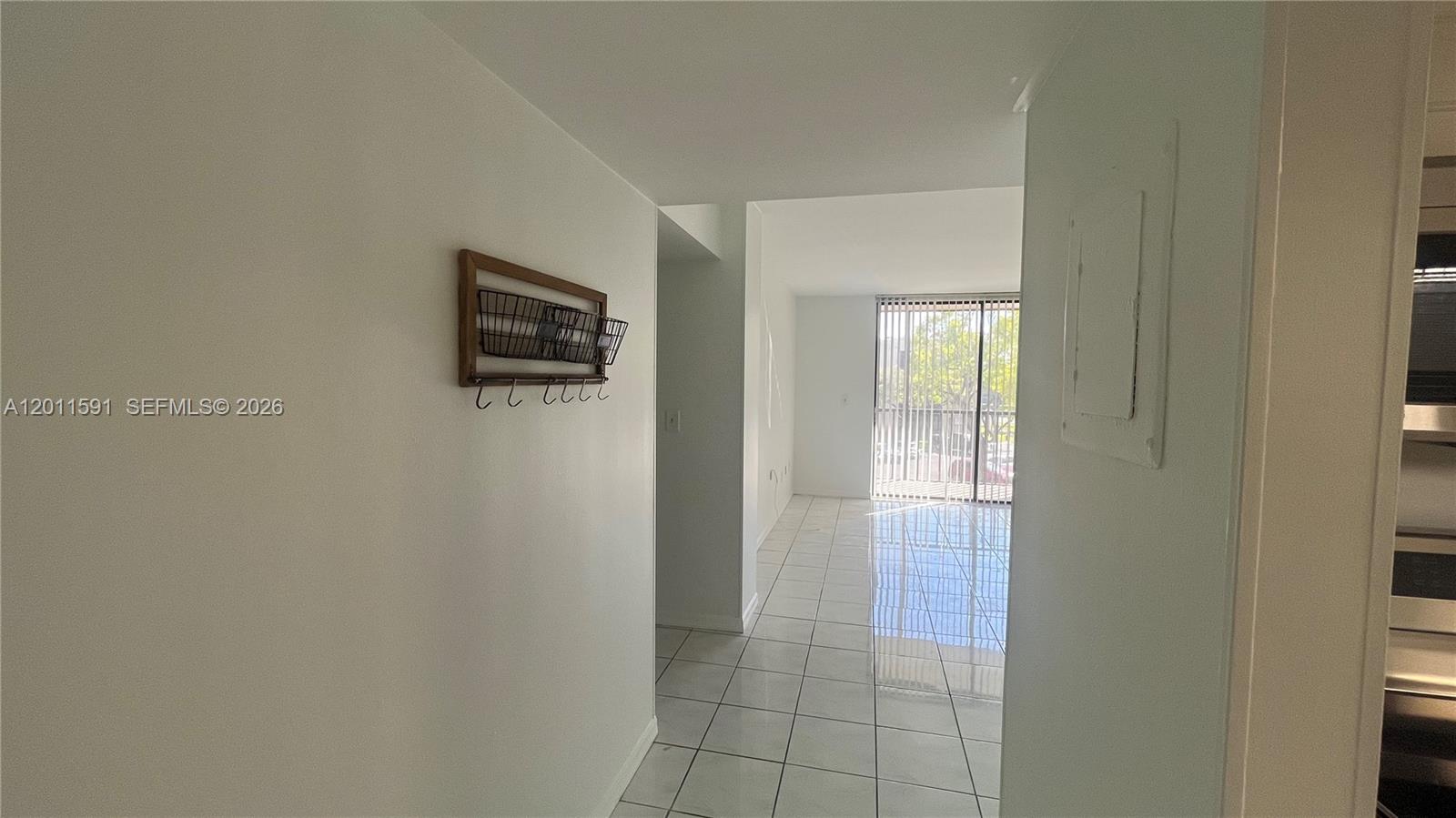 8540 Southwest 133rd Avenue Road, Unit 316 Miami, FL 33183 - Photo 5 of 18 a view of a hallway