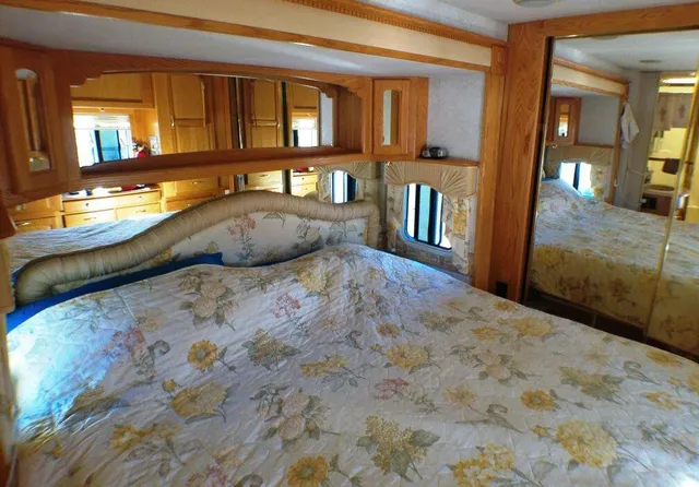 a utility room with wooden floor and cabinet