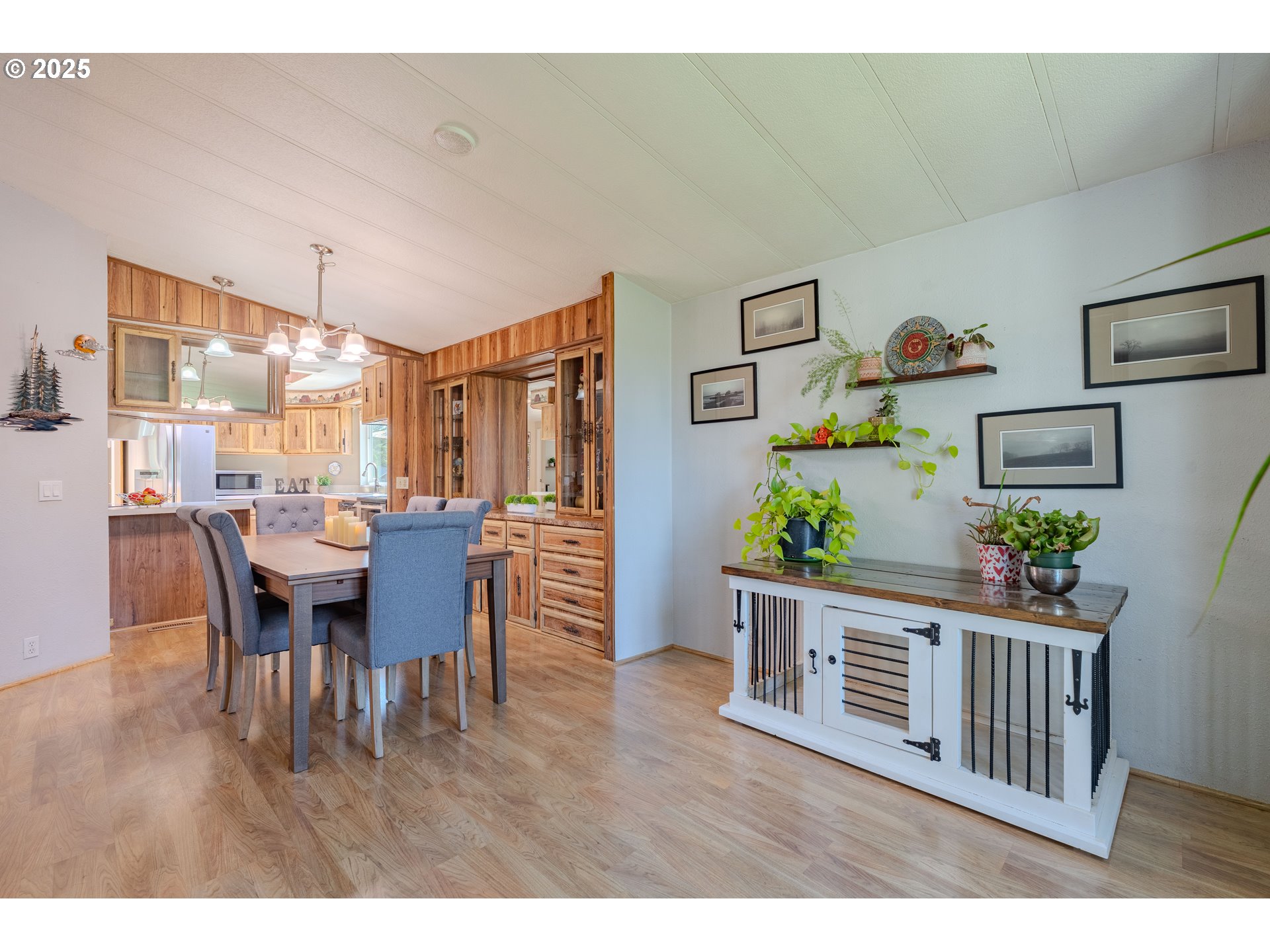 1317 Northeast 267th Avenue Camas, WA 98607 - Photo 11 of 43 a dining room with furniture and wooden floor