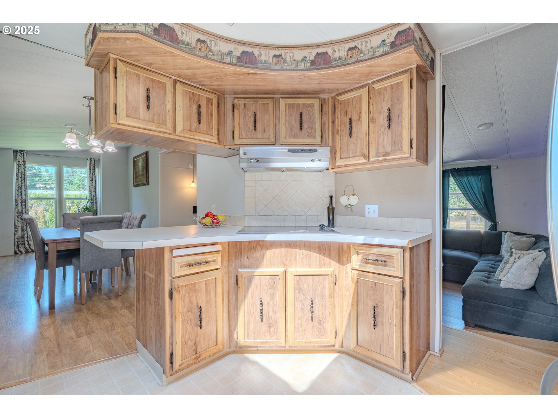 1317 Northeast 267th Avenue Camas, WA 98607 - Photo 15 of 43 a open kitchen with stainless steel appliances granite countertop a stove and a refrigerator