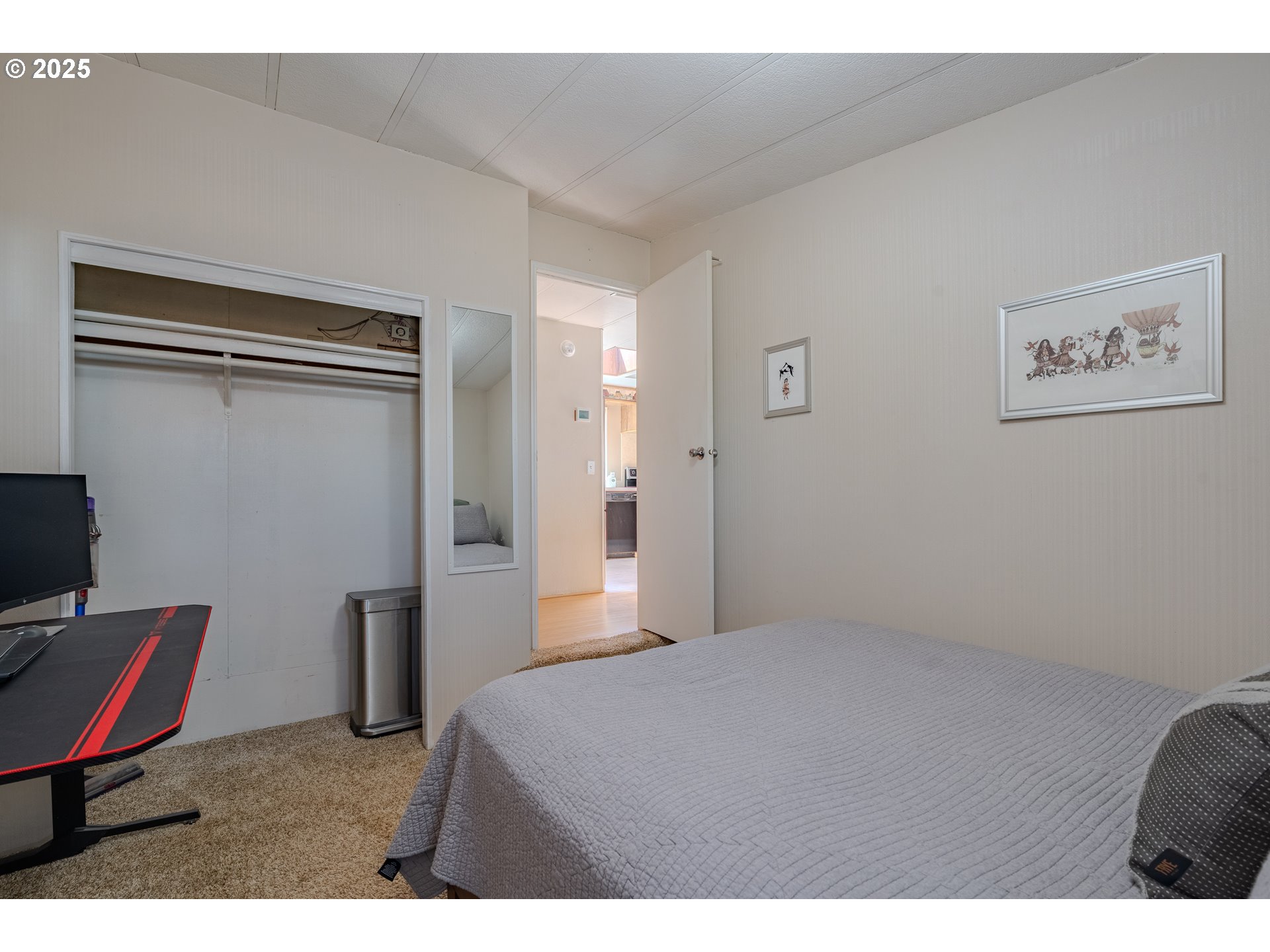 1317 Northeast 267th Avenue Camas, WA 98607 - Photo 19 of 43 a bedroom with a bed and a chair