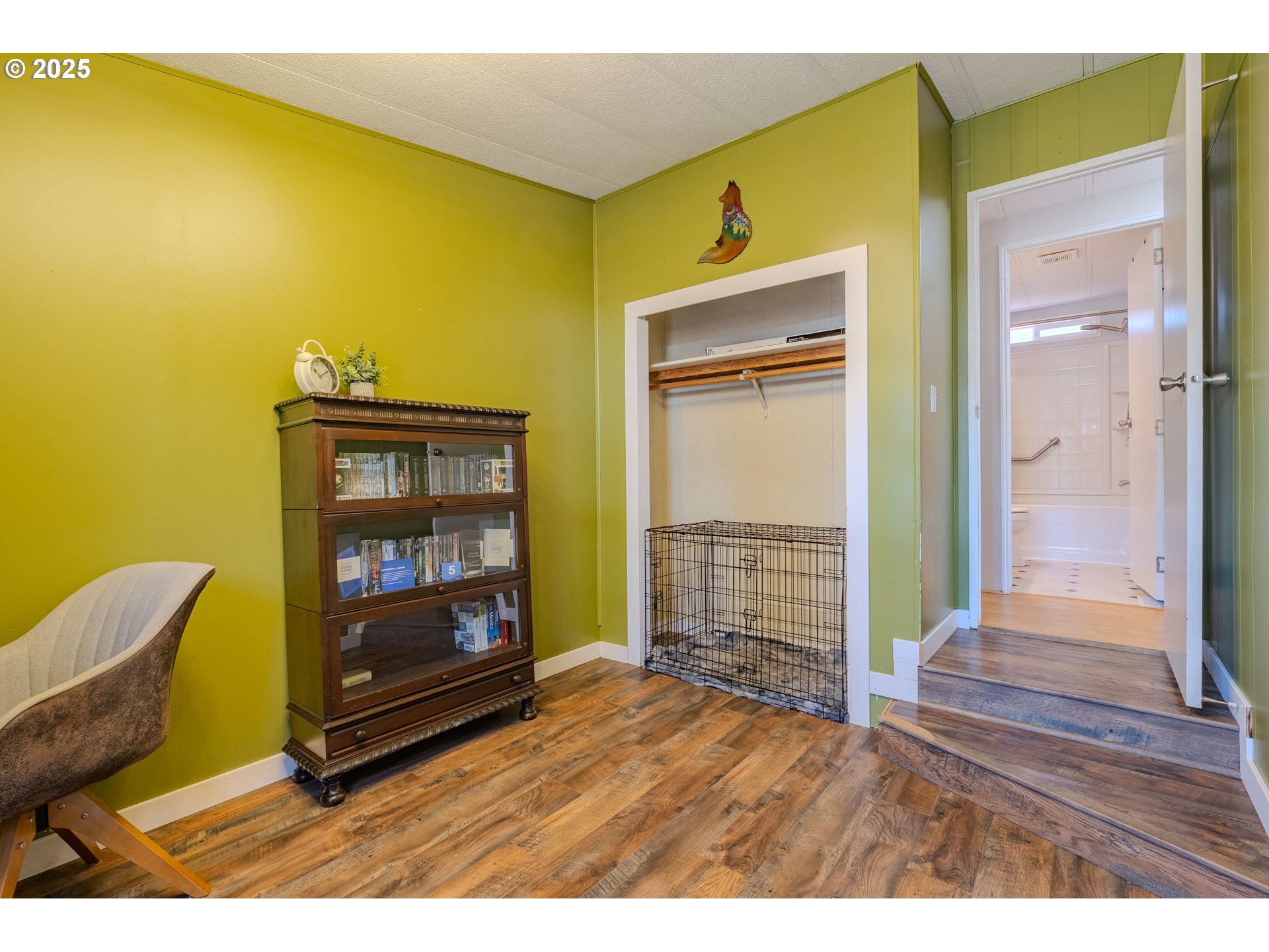 1317 Northeast 267th Avenue Camas, WA 98607 - Photo 24 of 43 a bedroom with a bed and a fireplace
