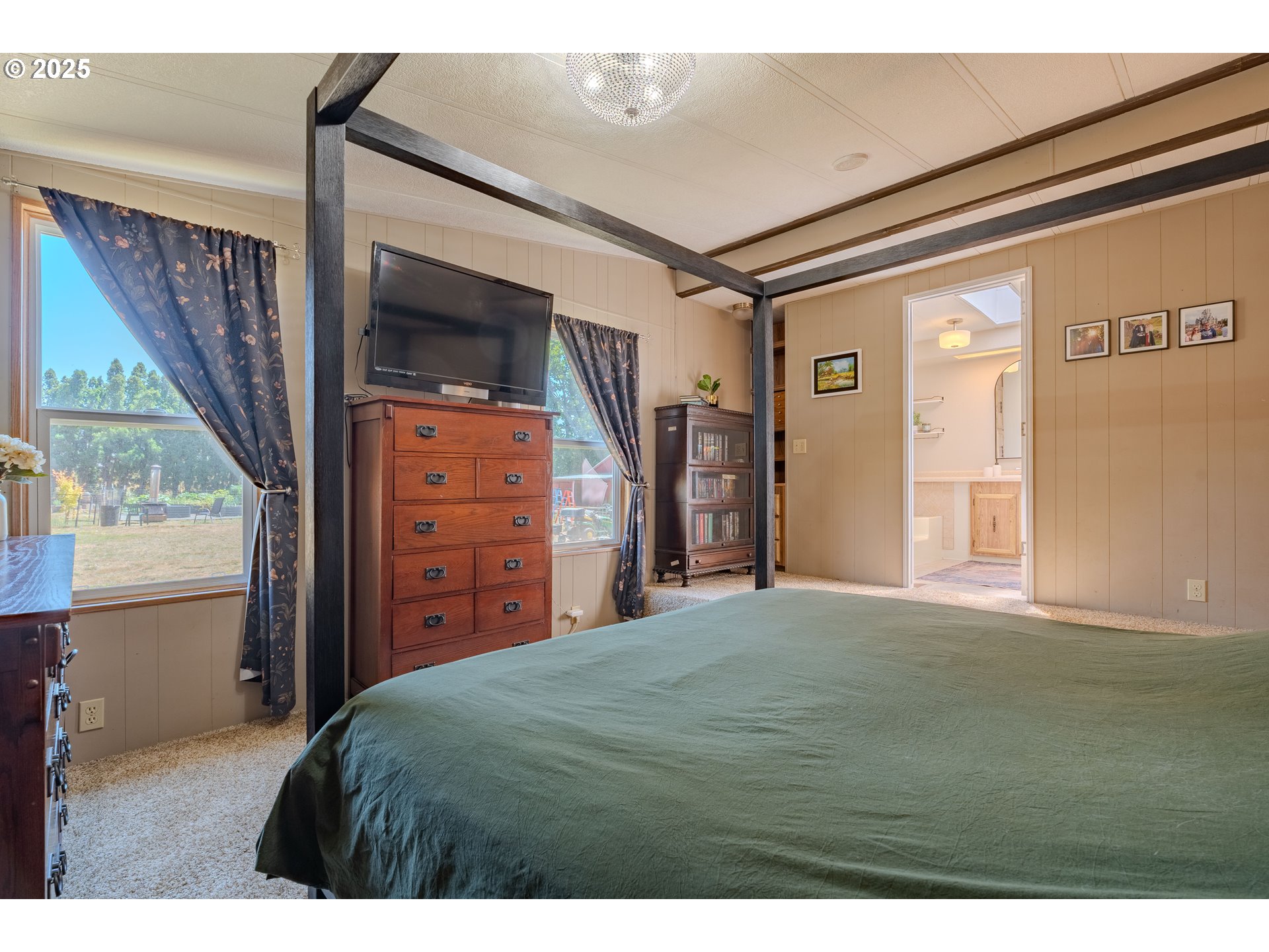 1317 Northeast 267th Avenue Camas, WA 98607 - Photo 25 of 43 a bedroom with a bed and a dresser