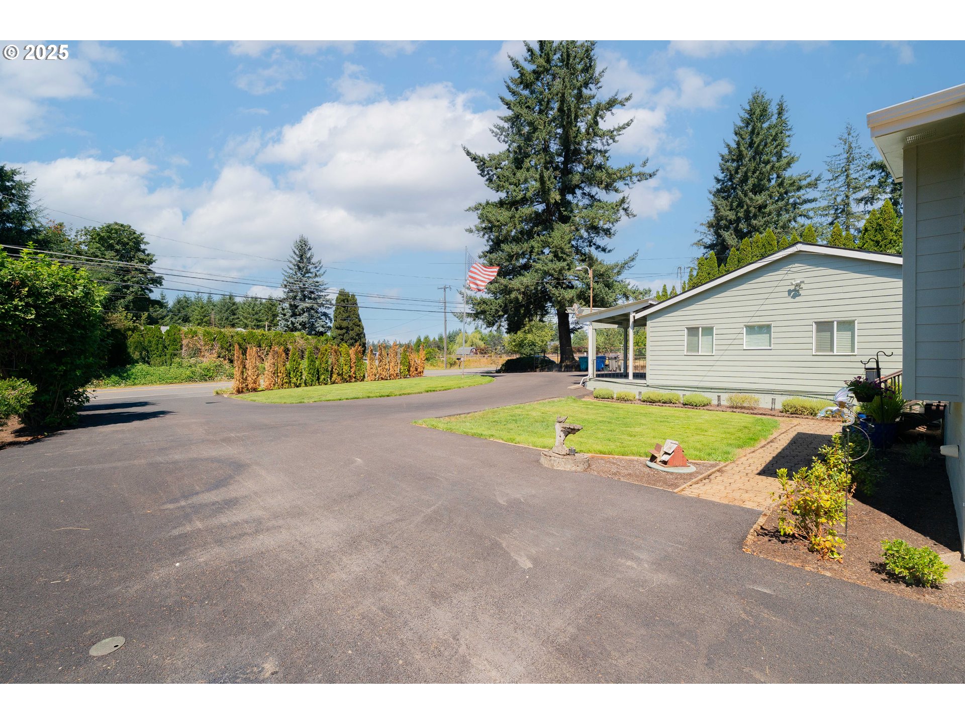 1317 Northeast 267th Avenue Camas, WA 98607 - Photo 41 of 43 a view of a swimming pool with a yard and plants
