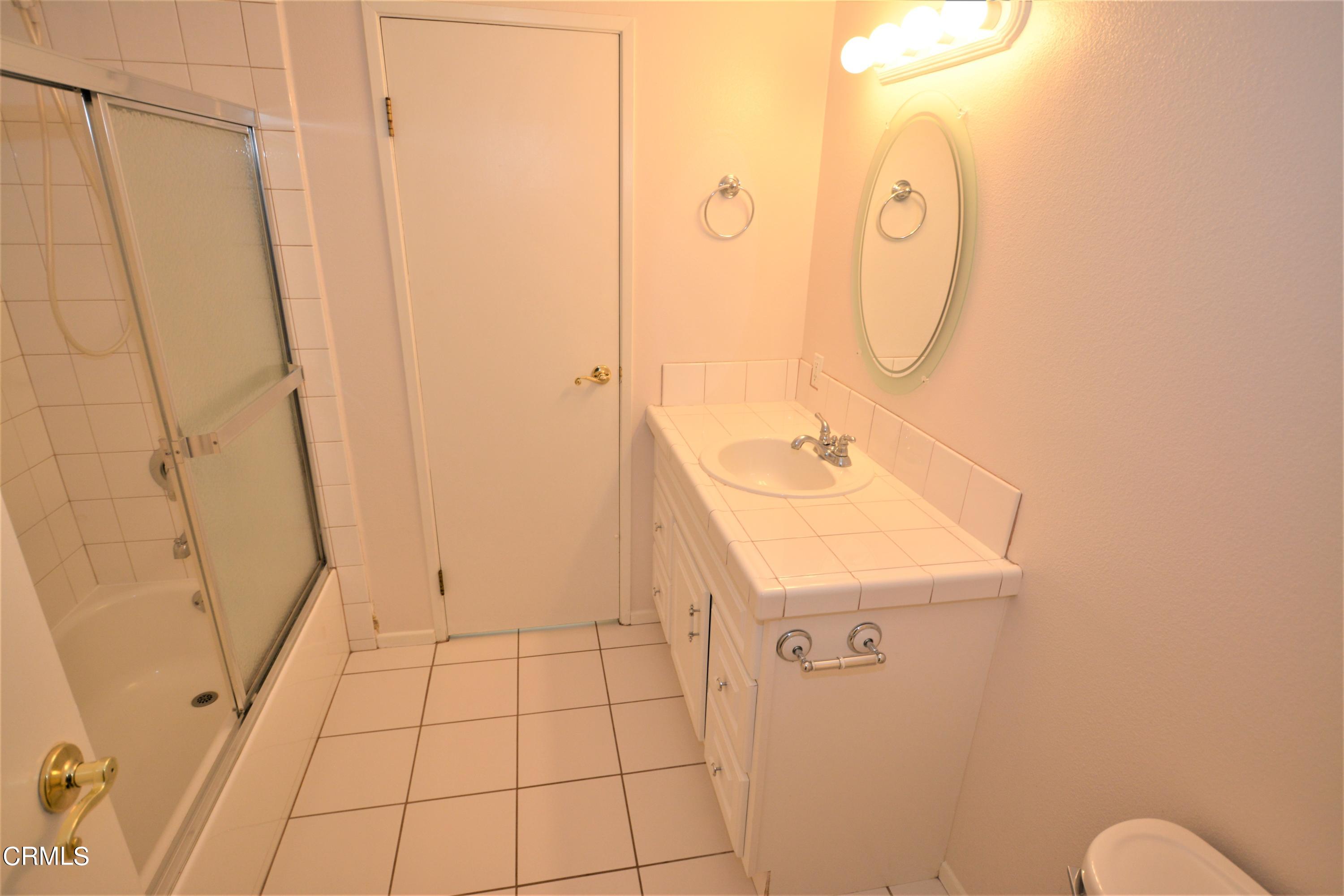 3252 Radcliffe Road Thousand Oaks, CA 91360 - Photo 14 of 31 a bathroom with a sink a toilet and shower