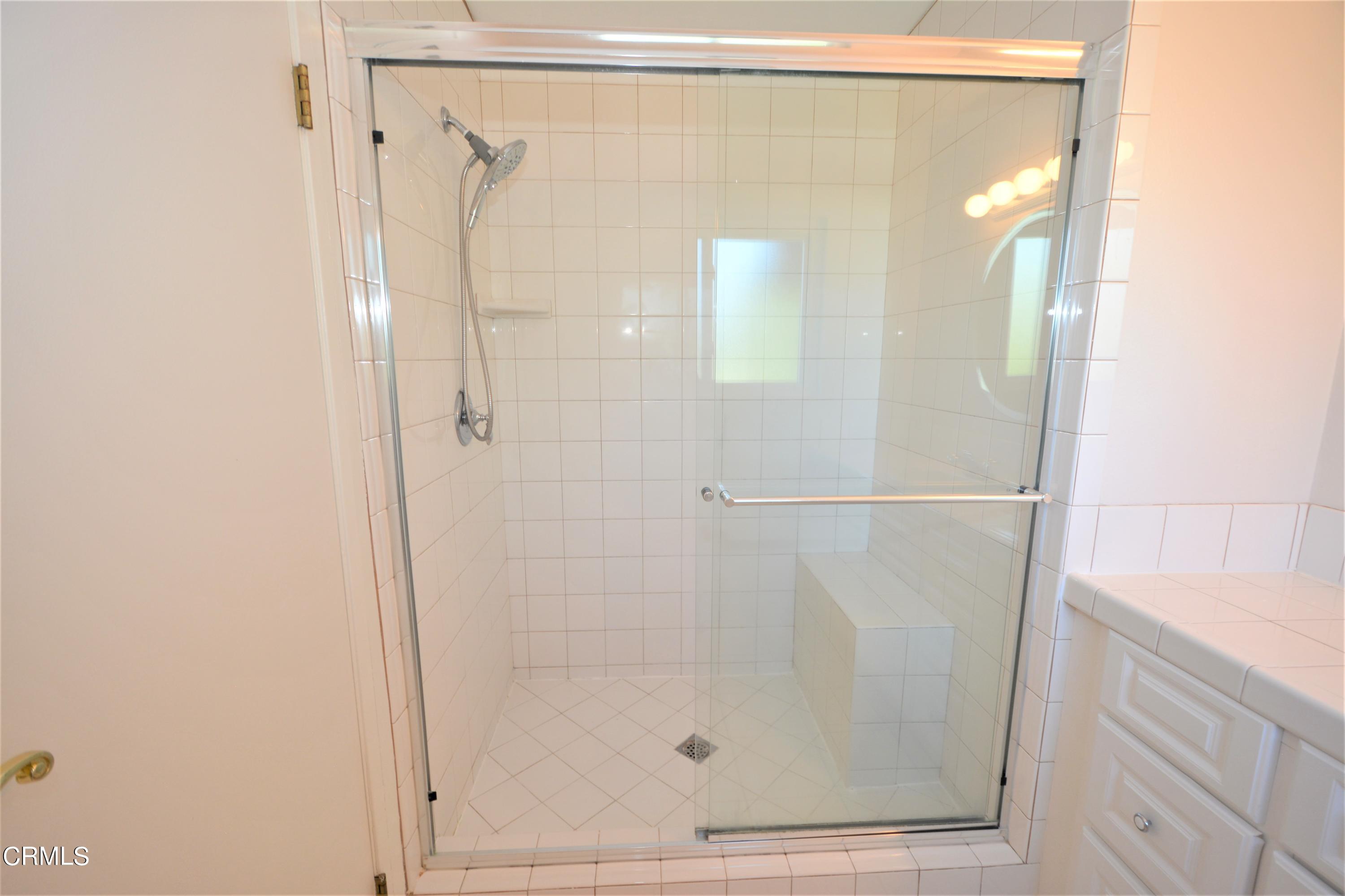3252 Radcliffe Road Thousand Oaks, CA 91360 - Photo 24 of 31 a bathroom with a glass shower door