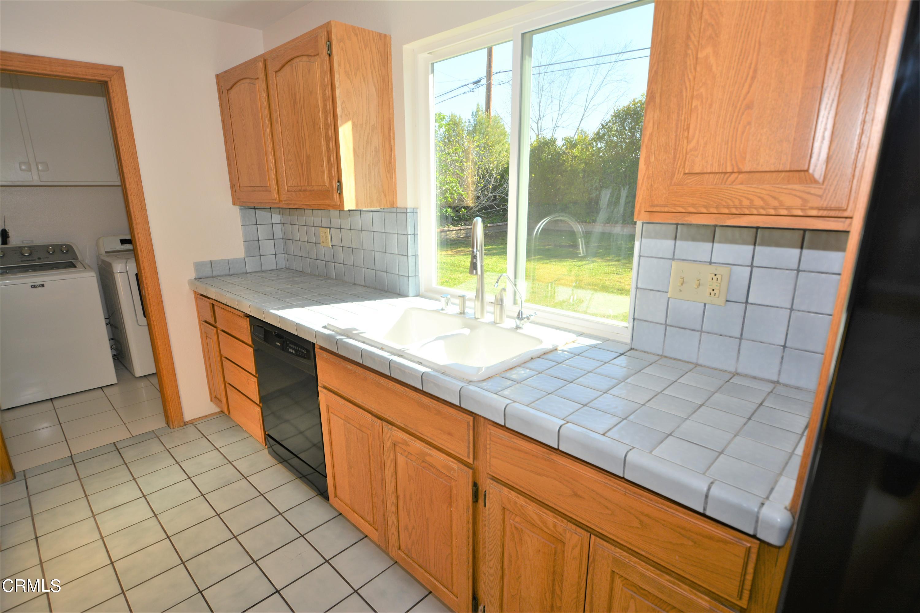 3252 Radcliffe Road Thousand Oaks, CA 91360 - Photo 10 of 31 a room with washing machine and sink