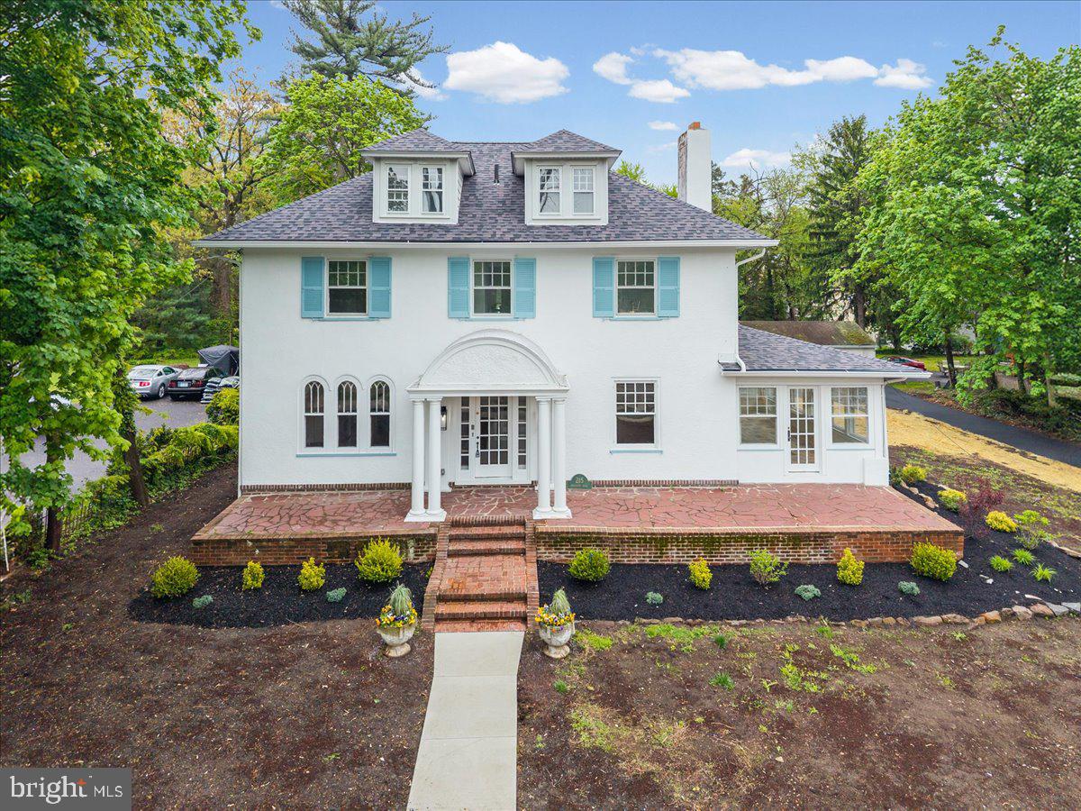 215 Browning Road Merchantville, NJ 08109 - Photo 2 of 55 Charming white estate with lush greenery.