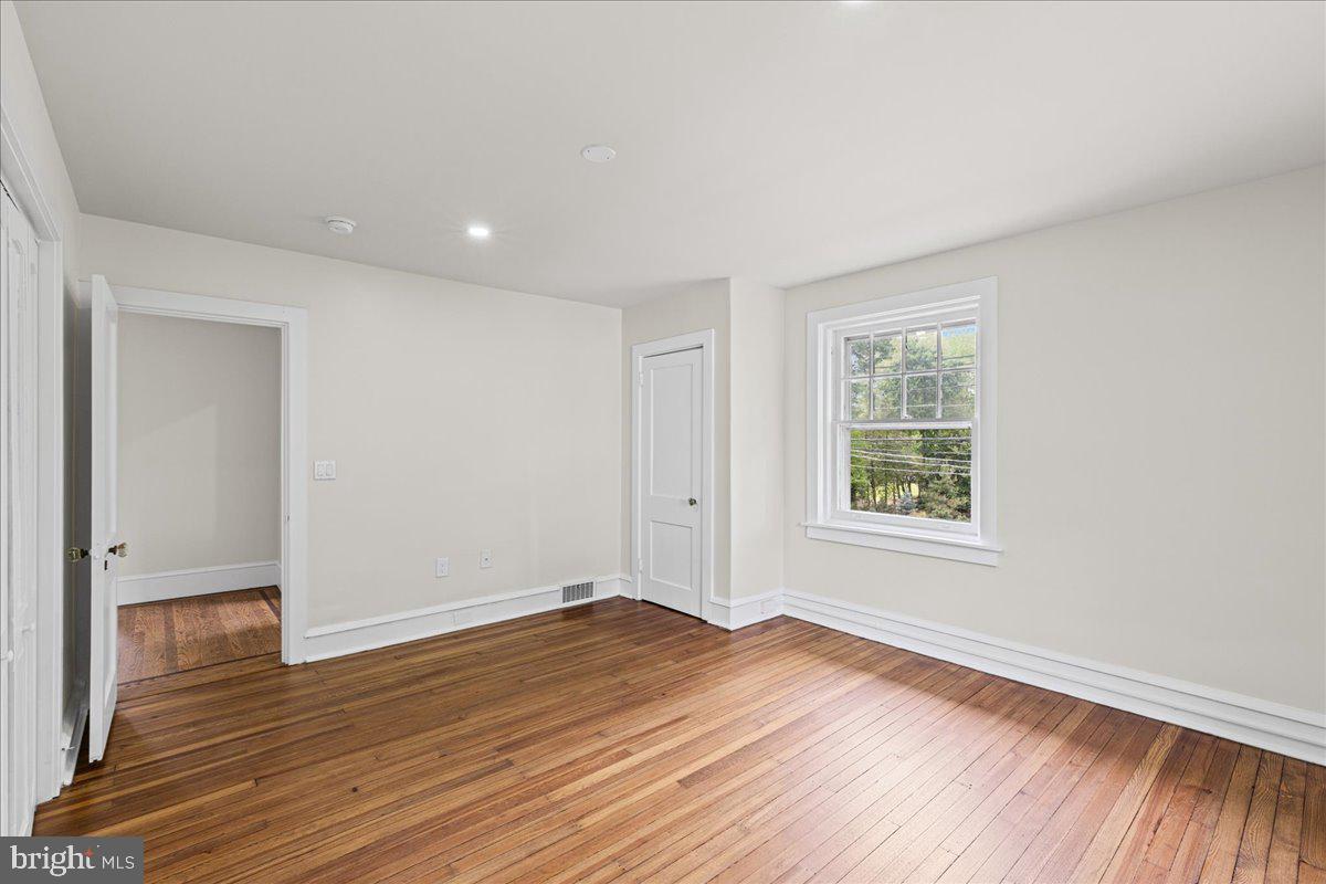 215 Browning Road Merchantville, NJ 08109 - Photo 30 of 55 Bright and airy room with hardwood floors.