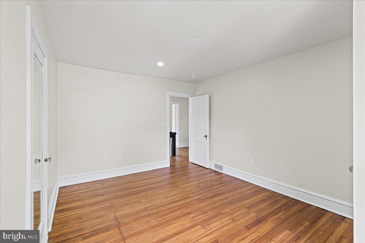215 Browning Road Merchantville, NJ 08109 - Photo 34 of 55 Spacious room with warm wood floors.