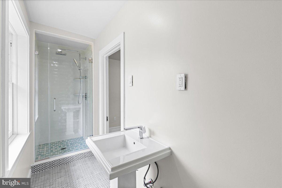 215 Browning Road Merchantville, NJ 08109 - Photo 37 of 55 Sleek modern bathroom with glass shower.