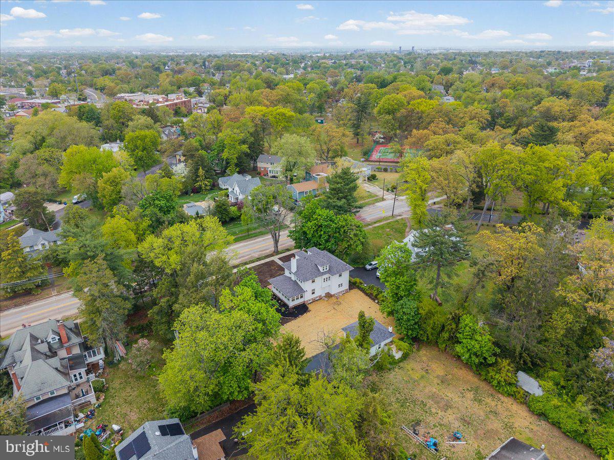215 Browning Road Merchantville, NJ 08109 - Photo 47 of 55 Lush greenery surrounds a charming home.