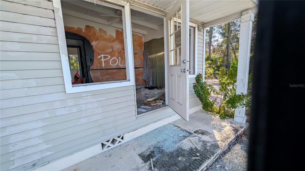 16836 Highway 19 Hudson, FL 34667 - Photo 11 of 16 a view of a porch with seating space