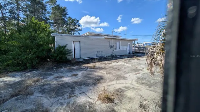 a view of a lake and a yard