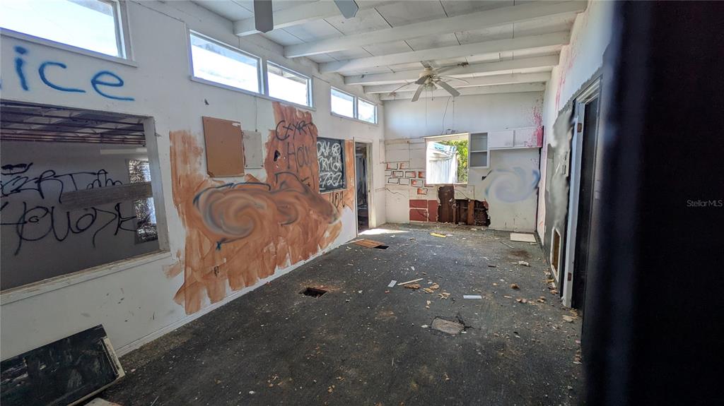 16836 Highway 19 Hudson, FL 34667 - Photo 7 of 16 a view of a hallway with a tv