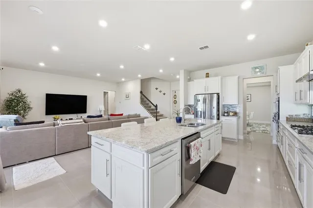 a bedroom with a bed and glass window