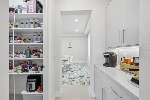 a bedroom with a bed and a cabinets
