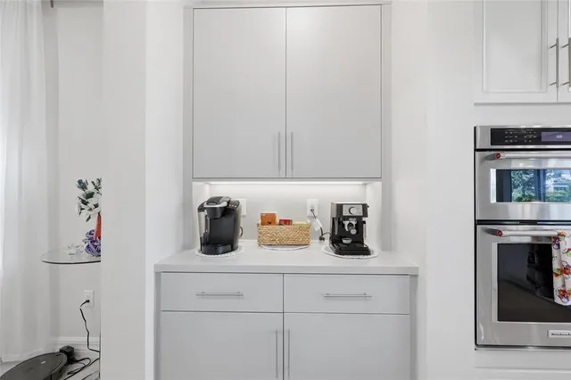 a view of room with furniture and flat screen tv