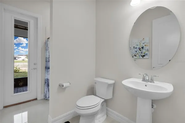 a bathroom with a sink double vanity and shower