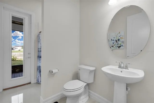a bathroom with a sink double vanity and shower