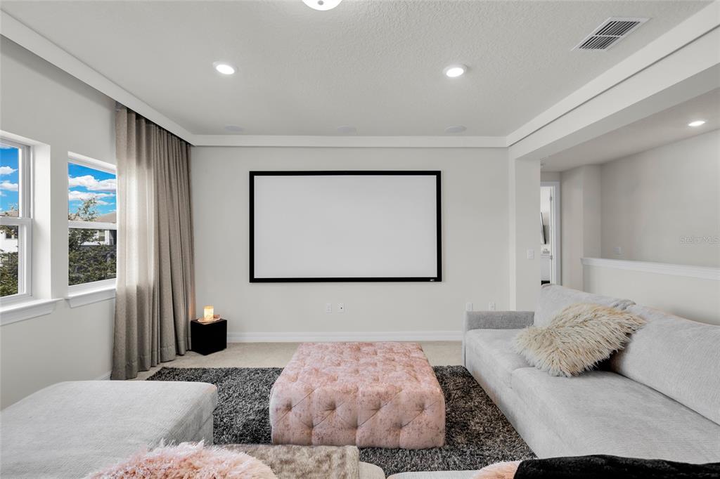 7537 Wandering Way Orlando, FL 32836 - Photo 24 of 71 a bedroom with a bed and glass window