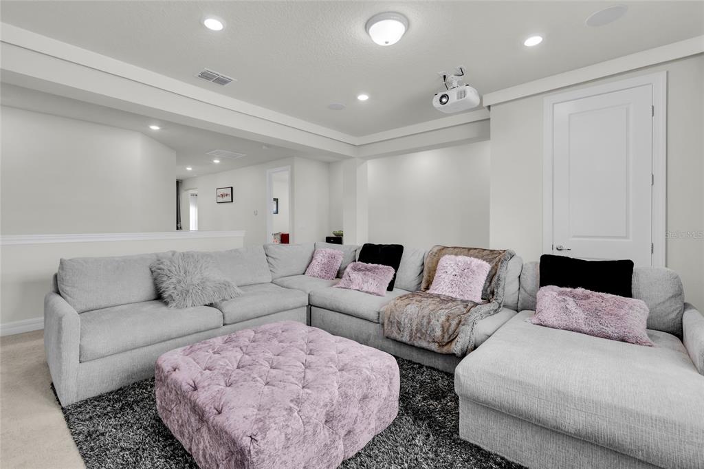 7537 Wandering Way Orlando, FL 32836 - Photo 26 of 71 a living room with furniture and a couch