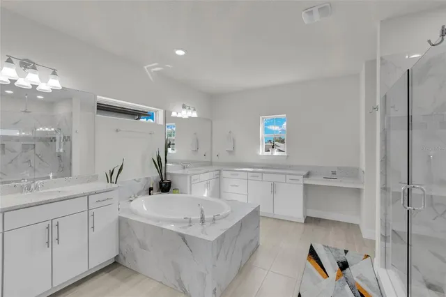 a room with a refrigerator and a window