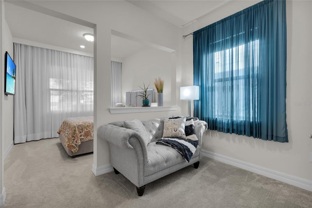 7537 Wandering Way Orlando, FL 32836 - Photo 45 of 71 a living room with furniture and a window