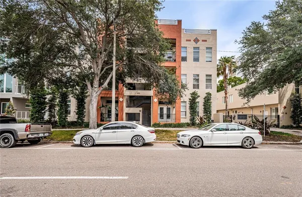 a view of a cars parked in front of a building