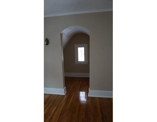 39 Neptune Avenue West Springfield, MA 01089 - Photo 12 of 28 a view of a hallway with wooden floor and a large window