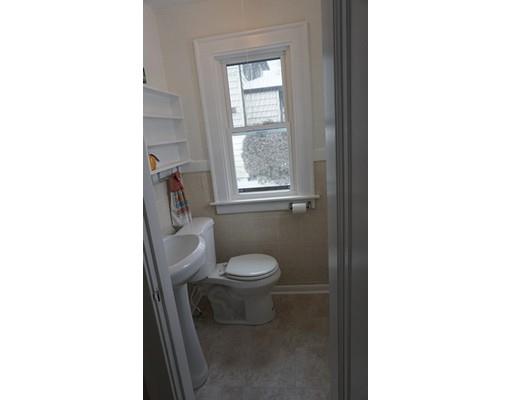 39 Neptune Avenue West Springfield, MA 01089 - Photo 15 of 28 a white toilet sitting next to a window