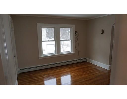39 Neptune Avenue West Springfield, MA 01089 - Photo 16 of 28 a black and white photo of a living room