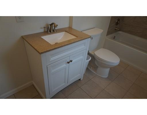 39 Neptune Avenue West Springfield, MA 01089 - Photo 21 of 28 a bathroom with a sink a toilet and bathtub