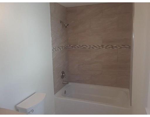 39 Neptune Avenue West Springfield, MA 01089 - Photo 22 of 28 a close up of a bathtub