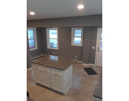 39 Neptune Avenue West Springfield, MA 01089 - Photo 6 of 28 a bathroom with a sink and mirror